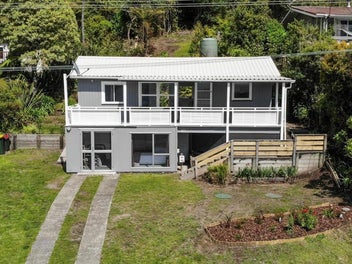 Charming Lakeside Cottage with potential