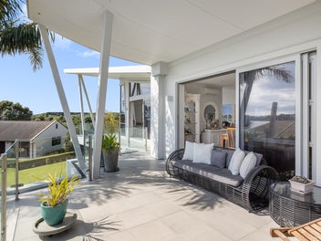 Car Enthusiasts Dream with Water Views