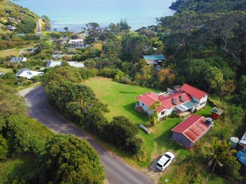 Sea Views & Location: Bach on 1,247m² Flat Site