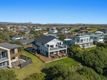 Impeccable Beachfront Living