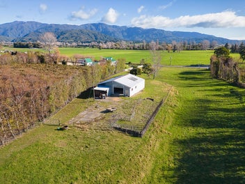 2 Acres of Possibilities: Large Shed Included
