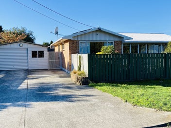 Modern low maintenance home in pristine condition.
