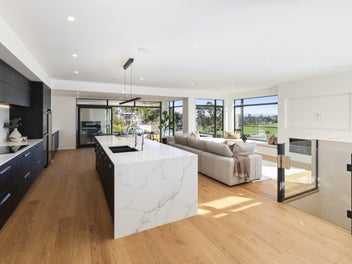 Modern masterpiece with triple car garaging