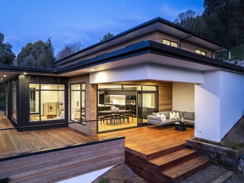 Modern masterpiece with triple car garaging