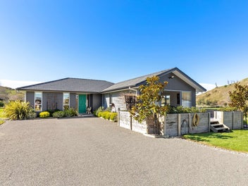 Luxury lifestyle with impressive garaging!