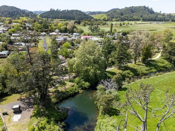 Price Reduced! River views and swimming hole!