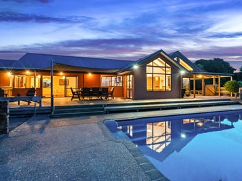 Kauri Views, Space, & Poolside Fun Await New Owner