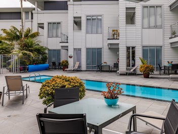 Ideal Investment: Poolside One-Bedroom Apartment