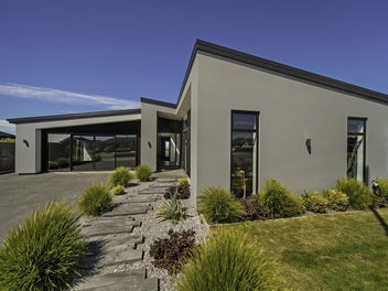 Striking Modern Elegance Meets Family Comfort