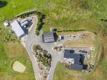 Two homes, 4.51ha, great shedding