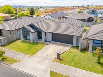 Brick & Beautifully Designed Family Home!