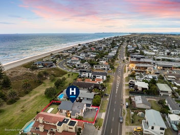 RARE BEACHFRONT OPPORTUNITY - SELLER MOTIVATED