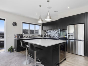 IMMACULATE FAMILY HOME WITH INLET VIEWS!