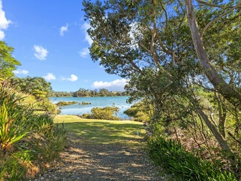 Home & Income Meets Waterfront Luxury