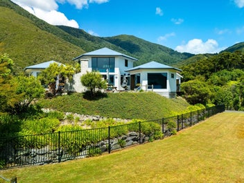 Elevated coastal retreat with endless potential