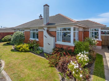 Renovated & Sunny 3-Bedroom Brick Home in...