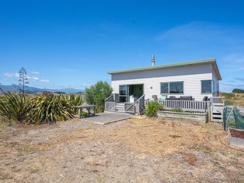 The Ultimate Weekend Retreat with Potential!!