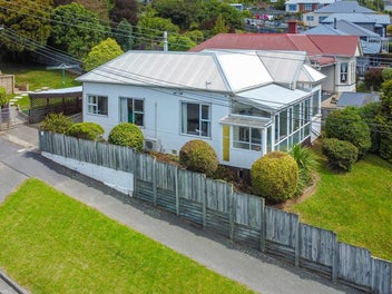 A Renovator's Dream with Stunning Views!