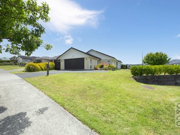 Four Bedroom, Two Living Golden Home...