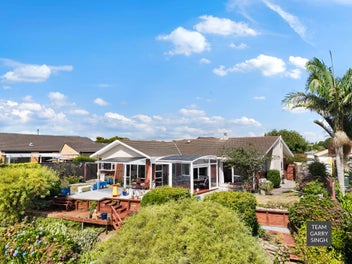 WATERFRONT STUNNER - MUST DOWNSIZE!