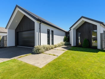 High-spec luxury home with pool, on reserve front