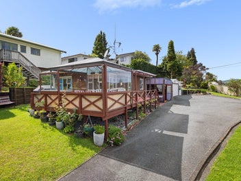 Development potential + land & 3 car garaging