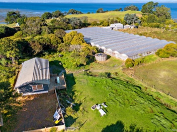 COASTAL RENOVATION OPPORTUNITY + GREENHOUSE