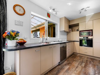 A Modern Delight with 4 car garaging!