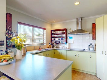 STUNNING FAMILY HOME IN SERENE KAURI GROVE