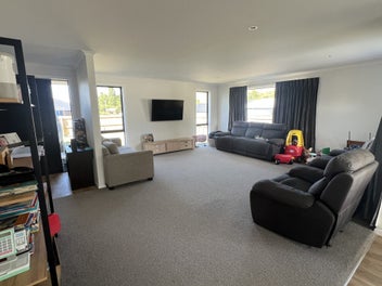 Modern 4 Bedroom Home with Sun Filled Living.