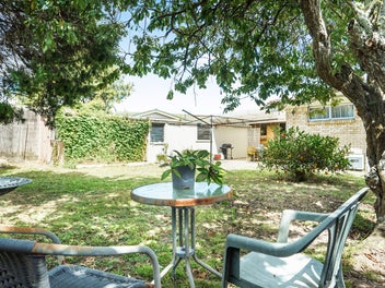 Hillcrest Brick Home With Extra Living!