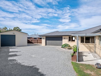Spacious Family Home With Expansive Garaging