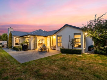 Great garaging, plentiful parking & priced to SELL