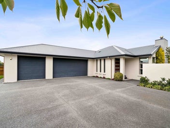 Great garaging, plentiful parking & priced to SELL