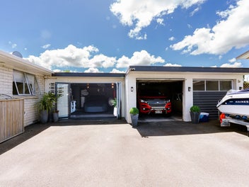Triple Garage with Workshop!