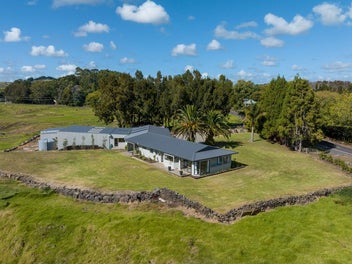 Large family home with multiple sheds