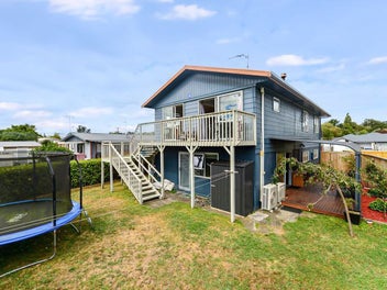 Spacious & Versatile Family Living in...