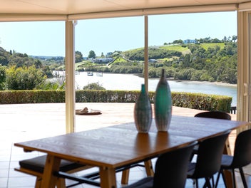 Experience Waterfront Living Close to Town