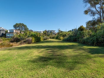 Prime Waterfront Location and Classic 1950s Home