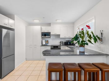 Spacious corner unit with elevated views