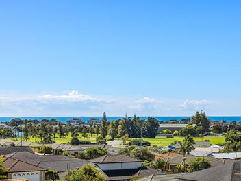 Sunlit serenity with stunning sea views