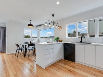 Renovated, Ready, Brick and Freehold!