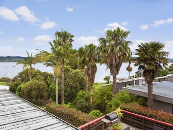 Break the Box! Split level home with Sea Views!