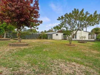Charming Family Home with Versatile Outdoor Space!