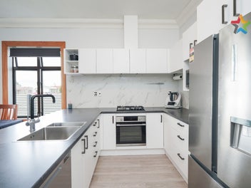 CHARMING FOUR-BEDROOM, TWO BATHROOM HOME