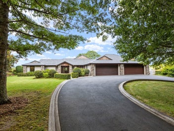 Home & Income Paradise with Subdivision Potential