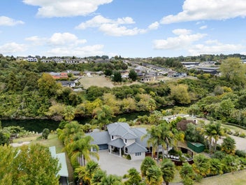 Tranquil Setting with River Views in the Heart of