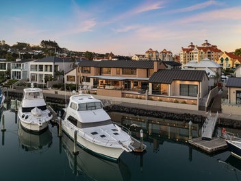 Expansive Marina Frontage & Two Exclusive Berths