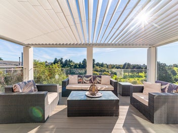 Architectural home overlooking the golf course.
