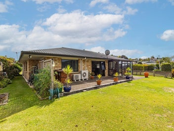 Modern Home With Views Awaits You!